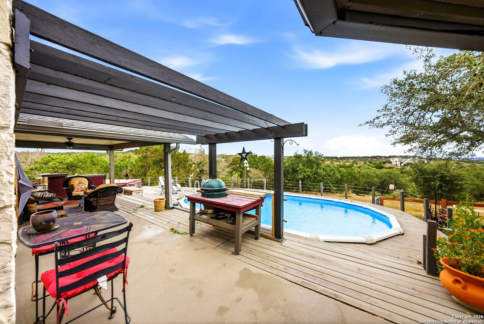 27150 Karsch Road Boerne, TX 78006 - Photo 42 of 79 a view of swimming pool with outdoor seating and plants