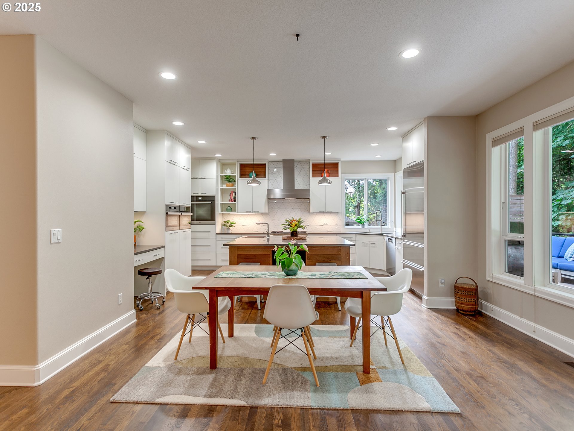 16870 Southwest Red Rock Way Beaverton, OR 97007 - Photo 14 of 45 a view of a dining room with furniture window and wooden floor