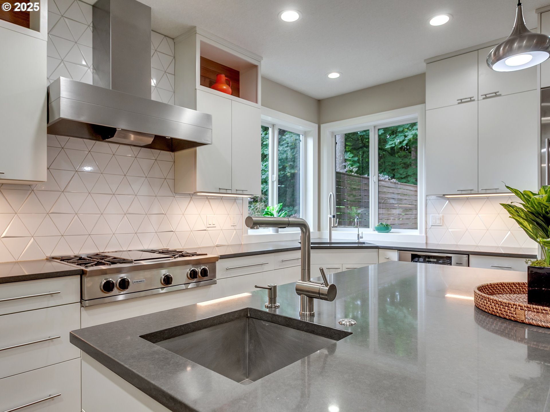 16870 Southwest Red Rock Way Beaverton, OR 97007 - Photo 18 of 45 a kitchen with a stove and a sink
