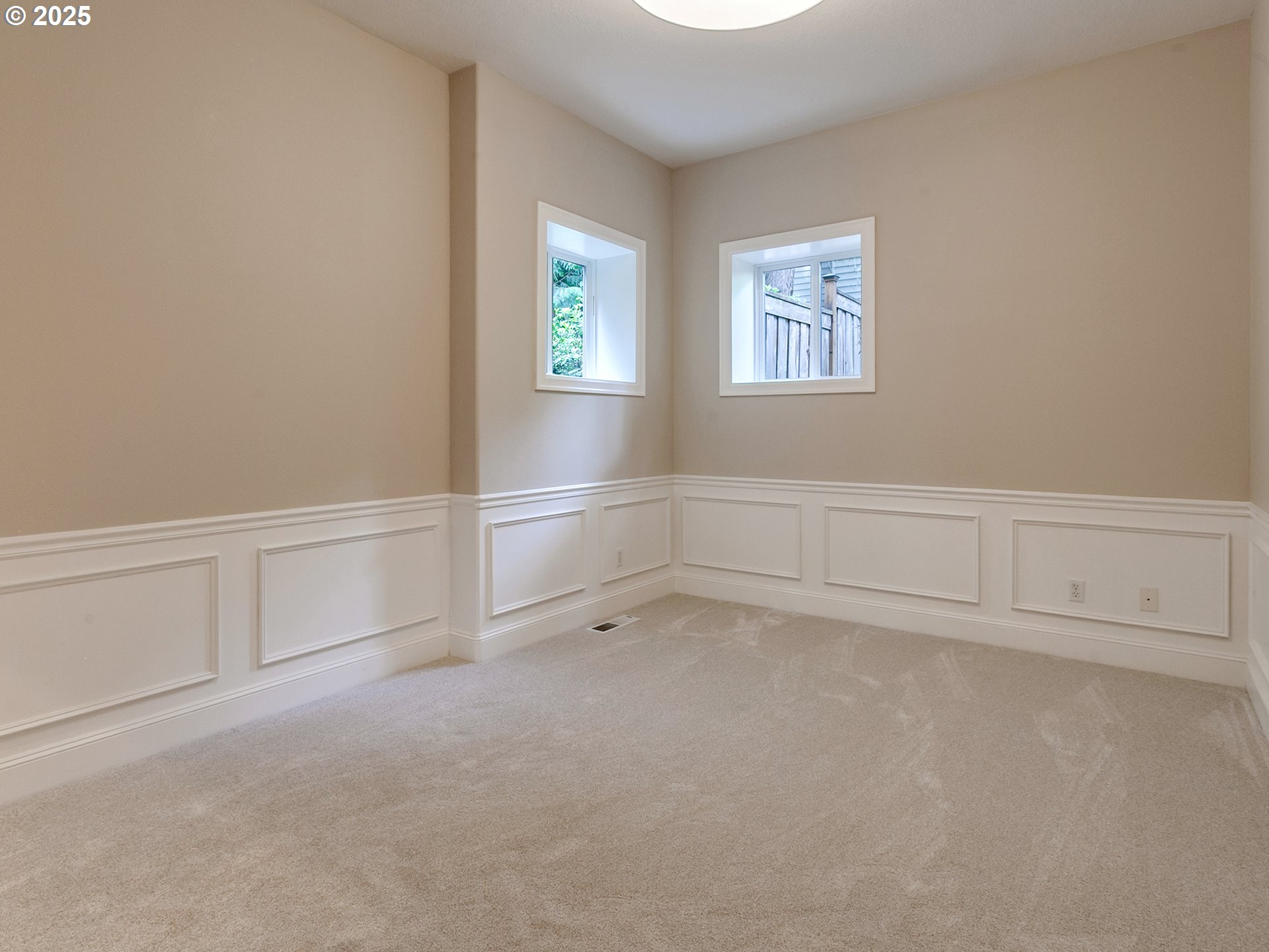 16870 Southwest Red Rock Way Beaverton, OR 97007 - Photo 23 of 45 an empty room with windows