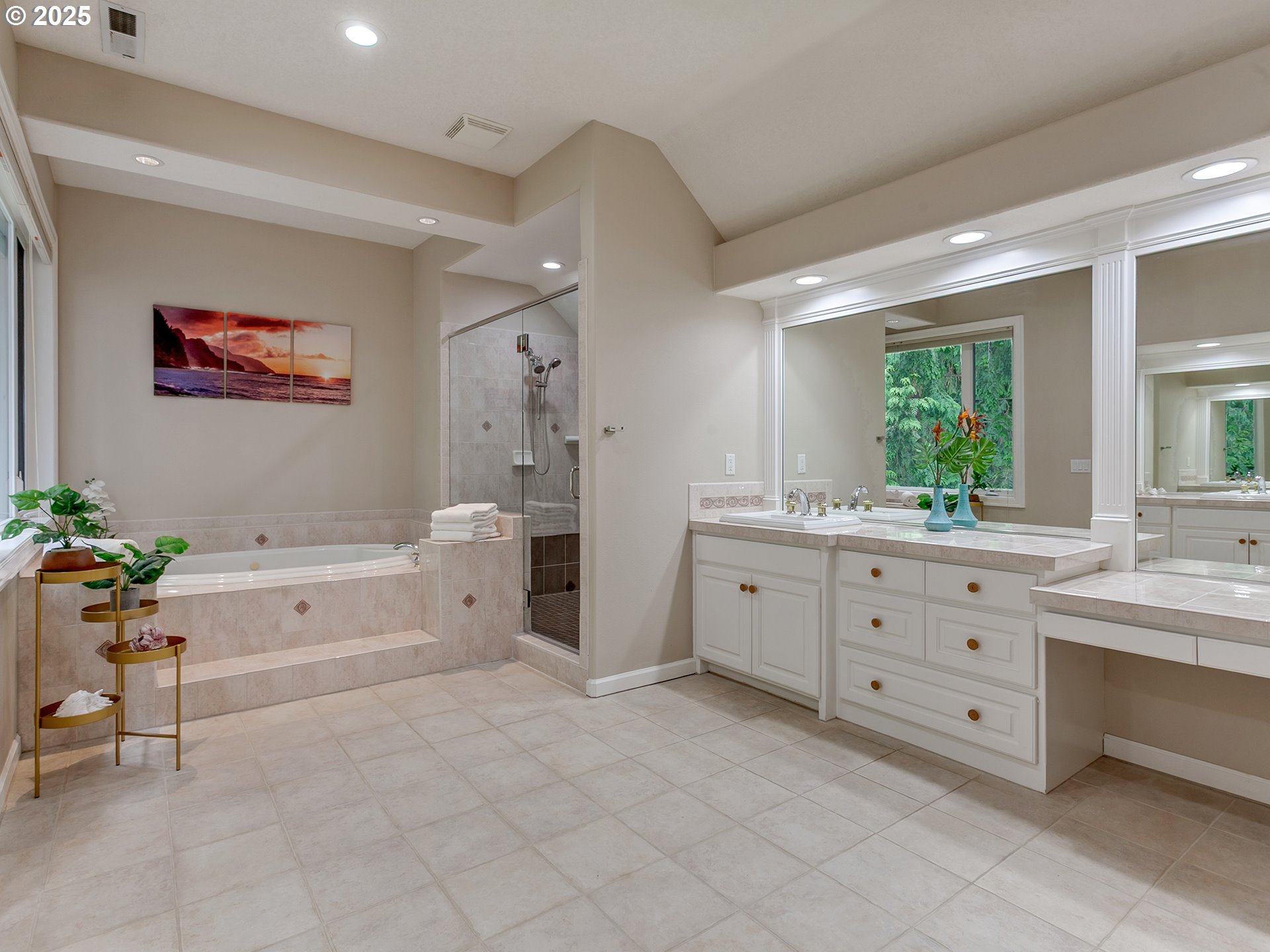 16870 Southwest Red Rock Way Beaverton, OR 97007 - Photo 28 of 45 a spacious bathroom with a granite countertop sink mirror and bathtub