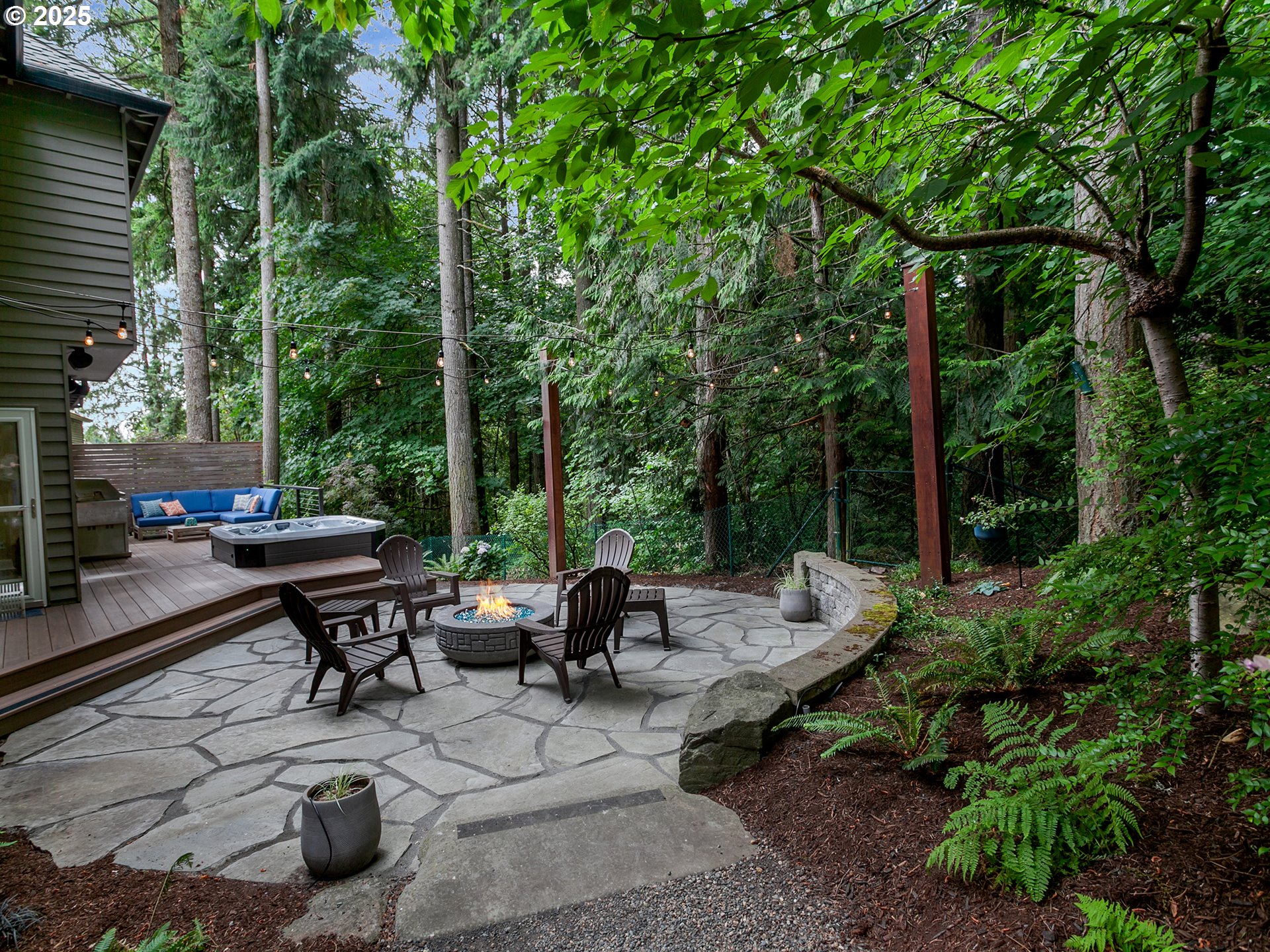 16870 Southwest Red Rock Way Beaverton, OR 97007 - Photo 34 of 45 a view of backyard with seating space and trees