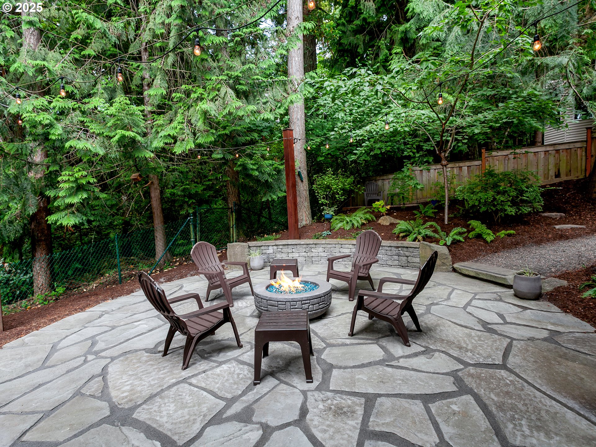16870 Southwest Red Rock Way Beaverton, OR 97007 - Photo 35 of 45 a view of a backyard with sitting area