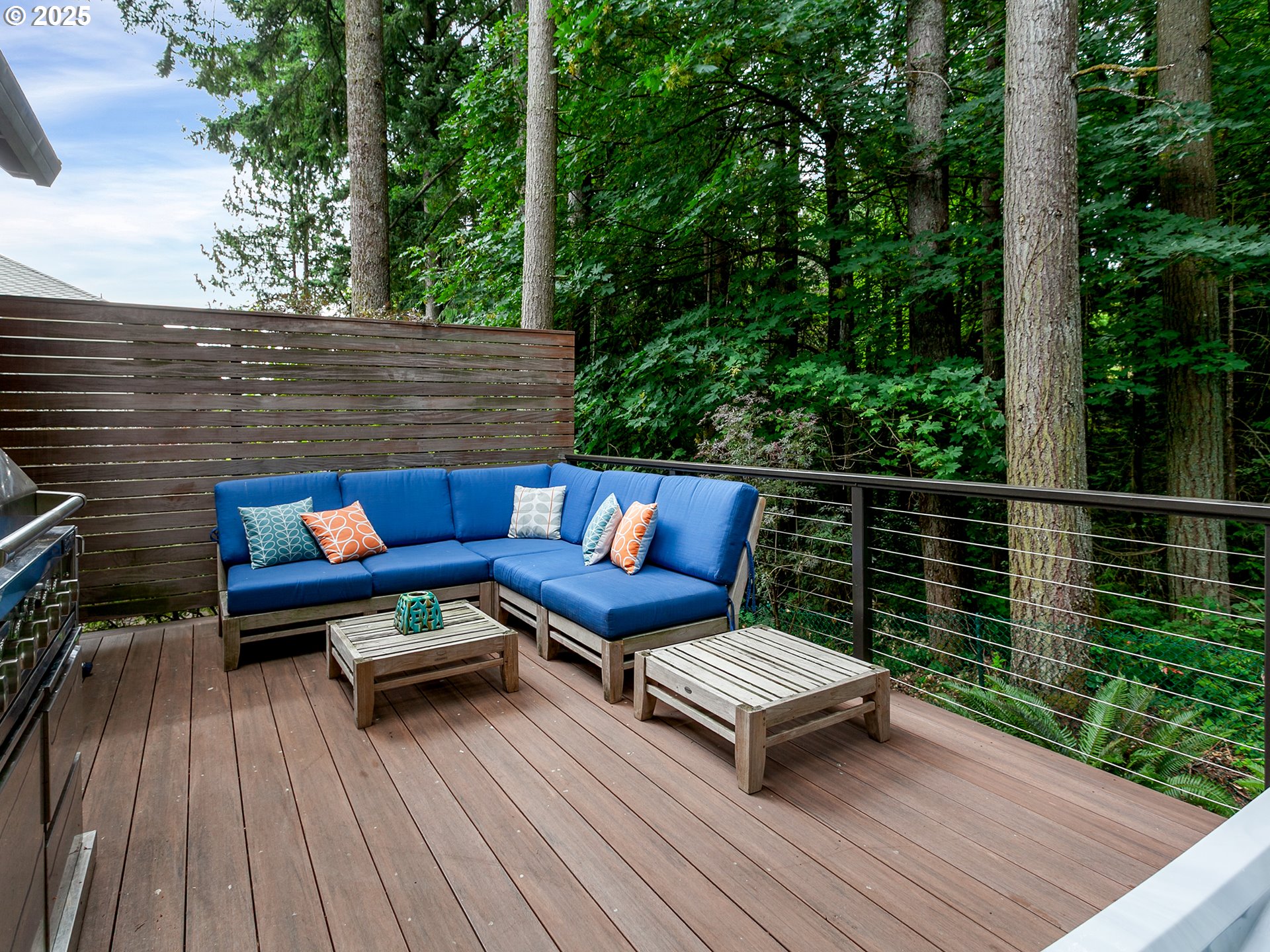 16870 Southwest Red Rock Way Beaverton, OR 97007 - Photo 37 of 45 a view of a wooden deck with furniture