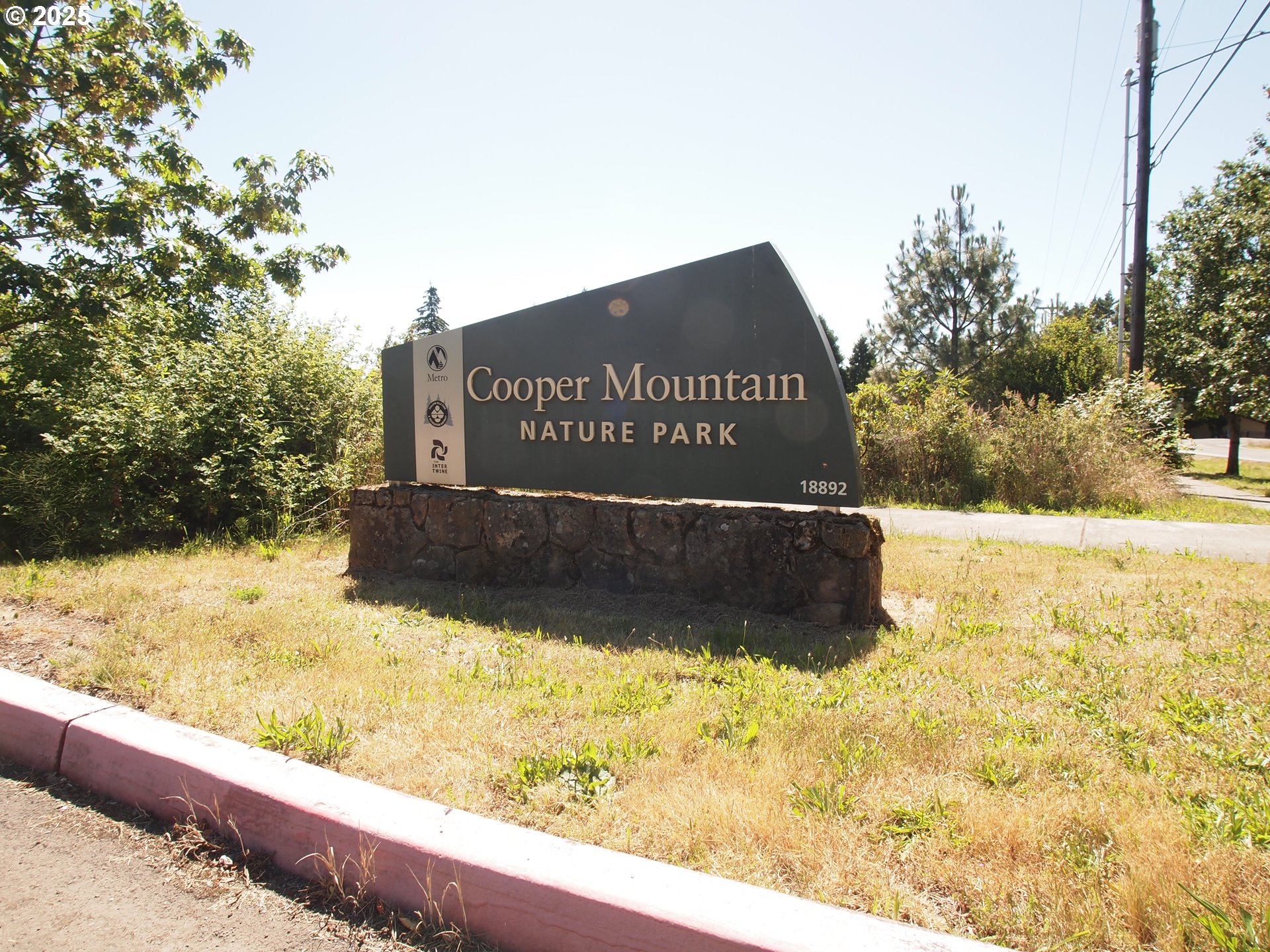 16870 Southwest Red Rock Way Beaverton, OR 97007 - Photo 40 of 45 a sign on the side of a road