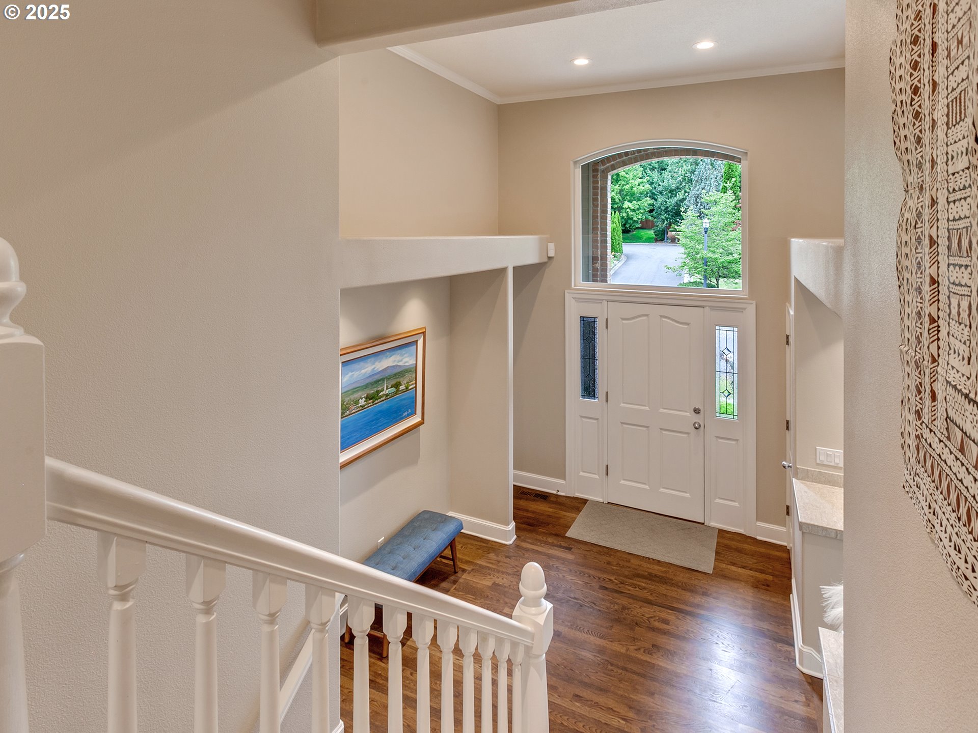 16870 Southwest Red Rock Way Beaverton, OR 97007 - Photo 4 of 45 a view of an entryway with wooden floor
