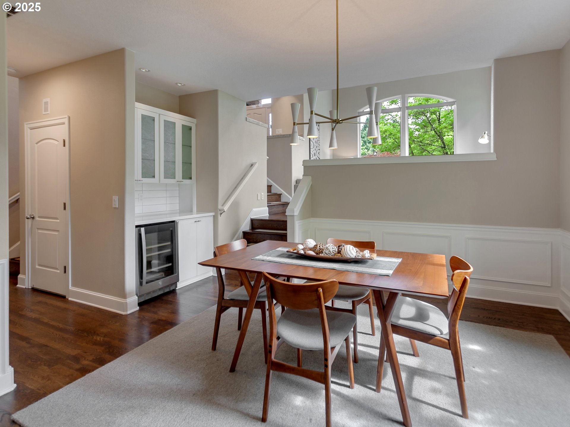 16870 Southwest Red Rock Way Beaverton, OR 97007 - Photo 8 of 45 a view of a dining room with furniture window and wooden floor