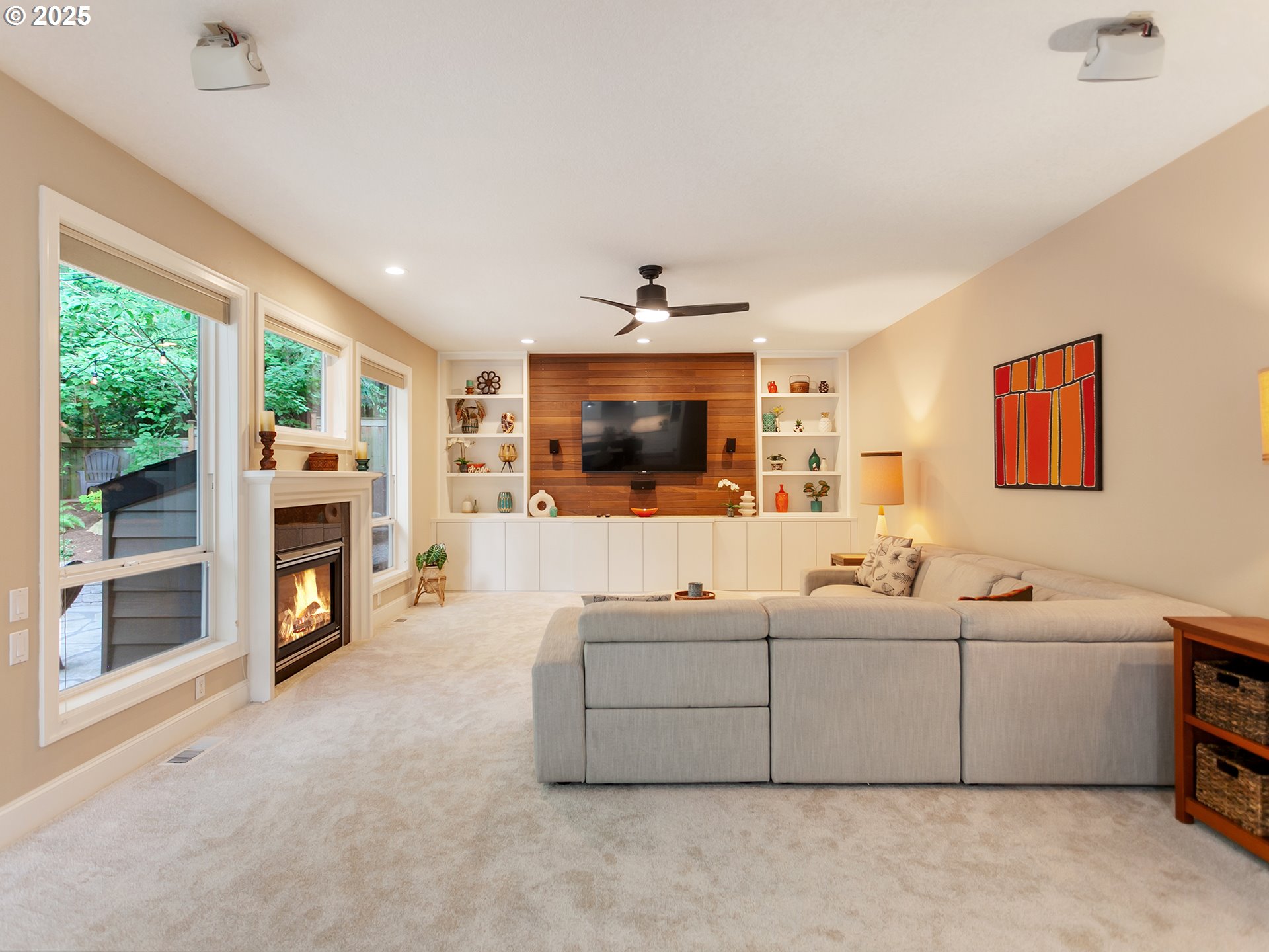 16870 Southwest Red Rock Way Beaverton, OR 97007 - Photo 9 of 45 a living room with furniture and a flat screen tv