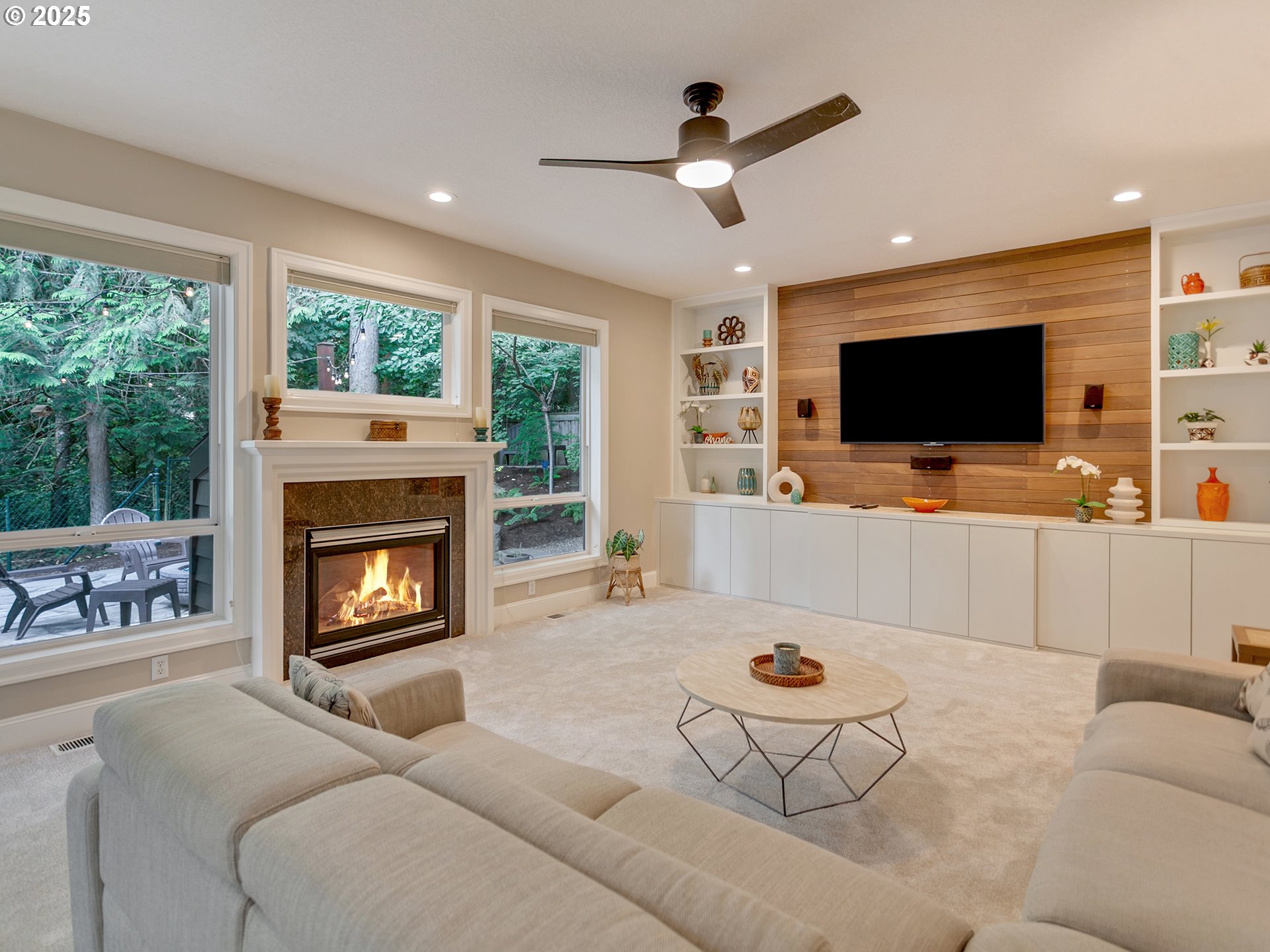 16870 Southwest Red Rock Way Beaverton, OR 97007 - Photo 10 of 45 a living room with furniture and a flat screen tv
