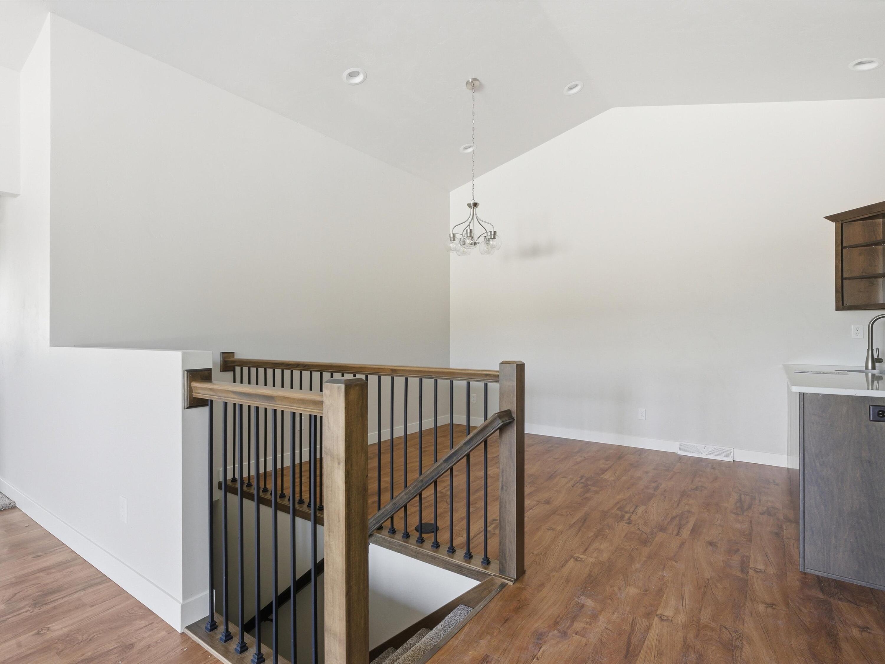 4403 Tannery Road Two Rivers, WI 54241 - Photo 6 of 27 Open staircase to lower leve