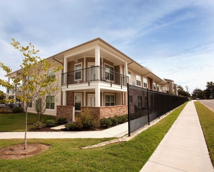 817 Colcord Avenue Waco, TX 76707 - Photo 2 of 15 a front view of a house with a swimming pool