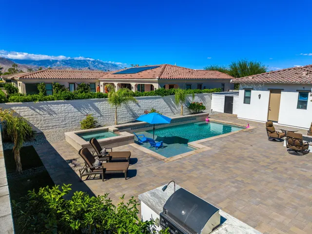 an outdoor view of garden with patio