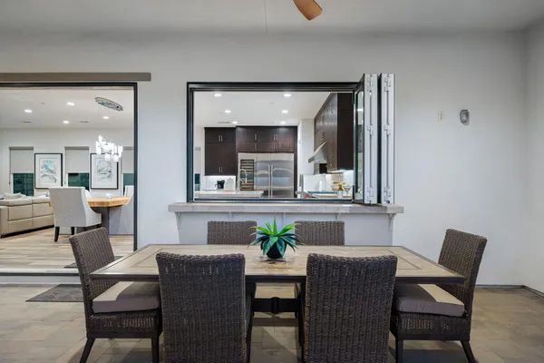 a view of a dining room with furniture