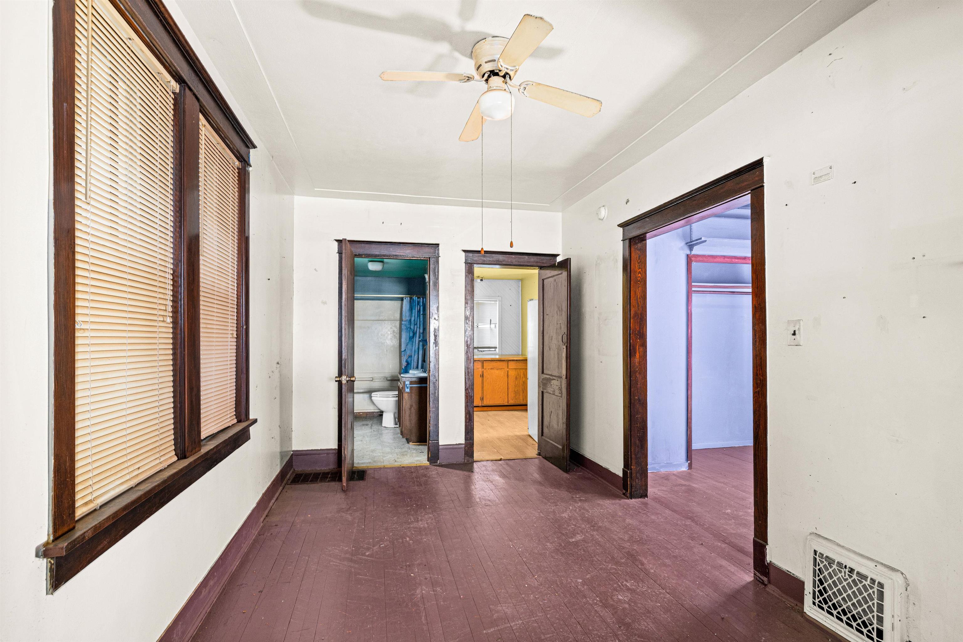 2826 West 3rd Street Duluth, MN 55806 - Photo 7 of 21 Corridor with dark wood finished floors and baseboards