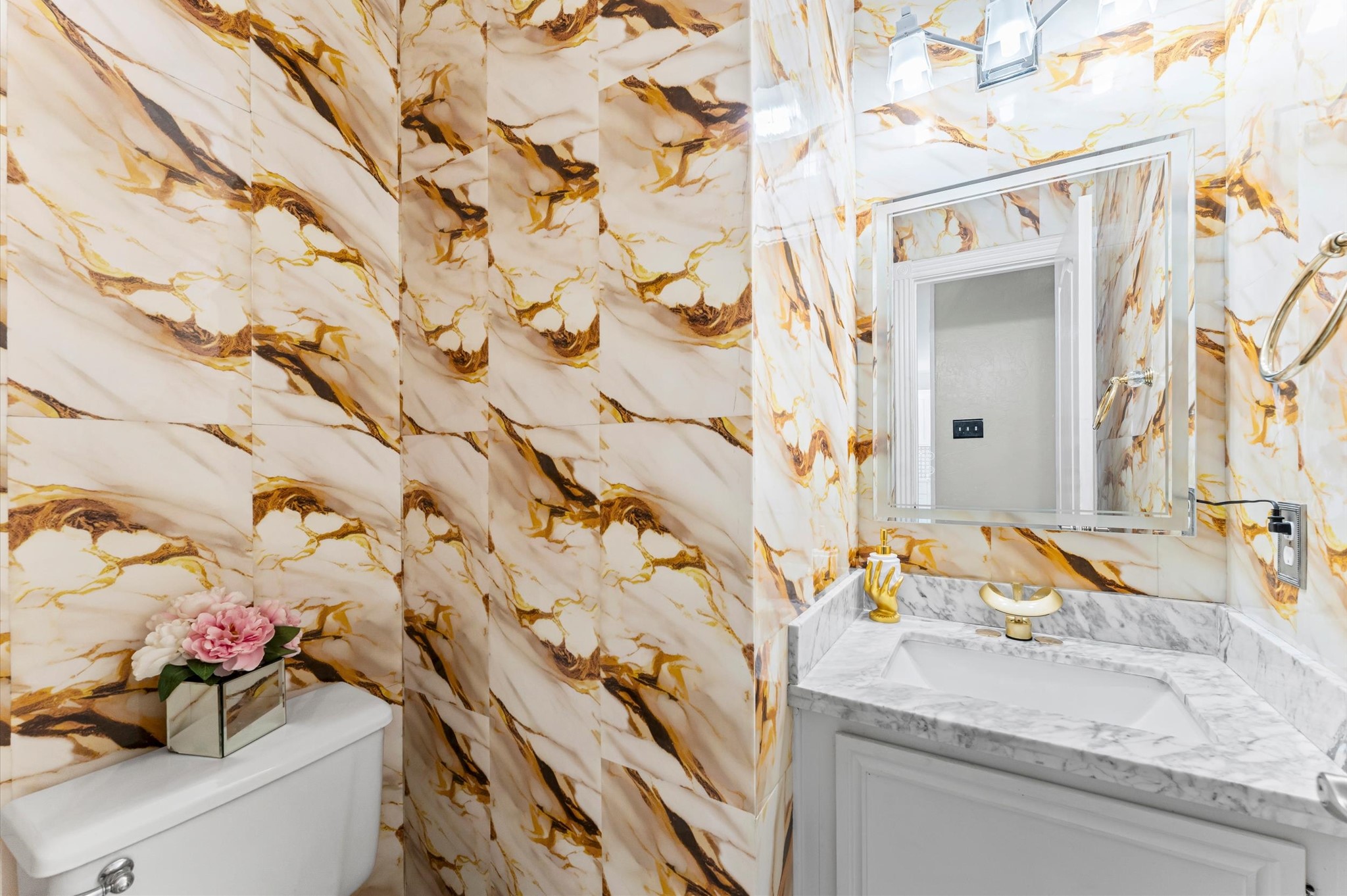 16506 Crossfield Drive Houston, TX 77095 - Photo 11 of 20 a bathroom with a granite countertop sink and a mirror