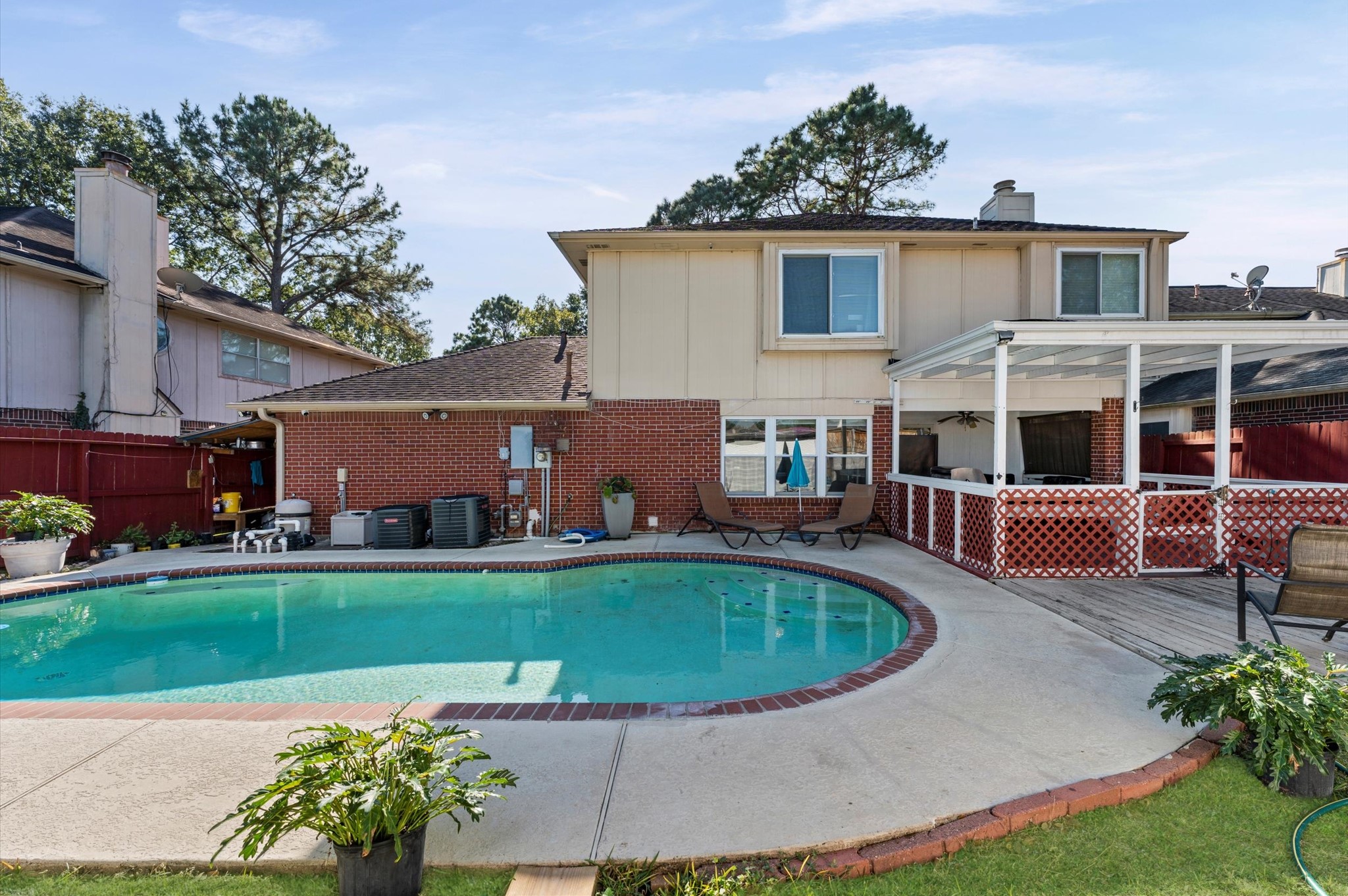 16506 Crossfield Drive Houston, TX 77095 - Photo 20 of 20 a view of a house with a swimming pool
