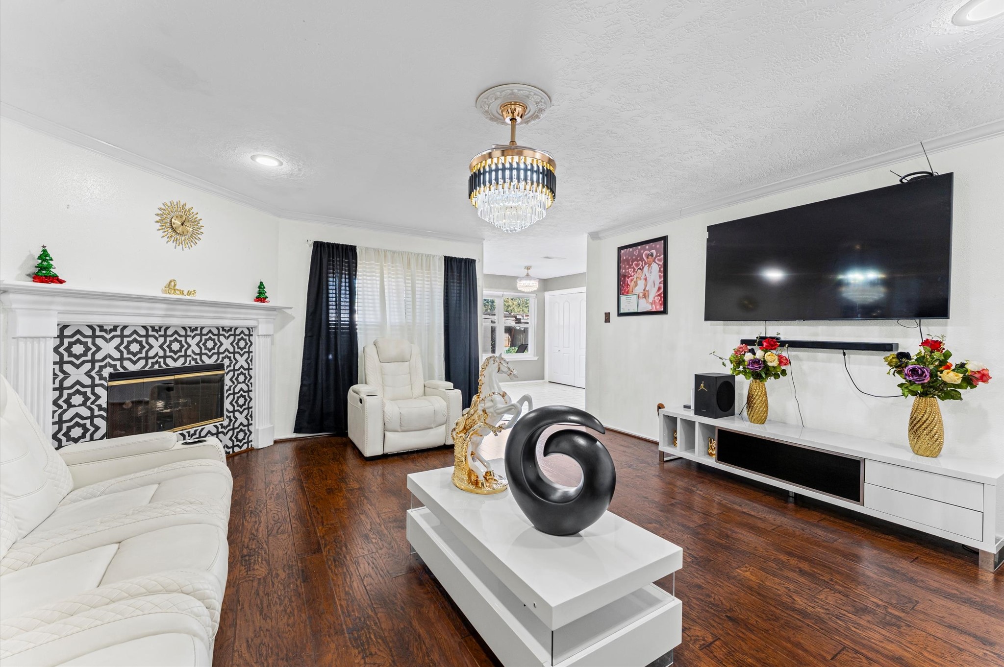 16506 Crossfield Drive Houston, TX 77095 - Photo 5 of 20 a living room with furniture and a flat screen tv