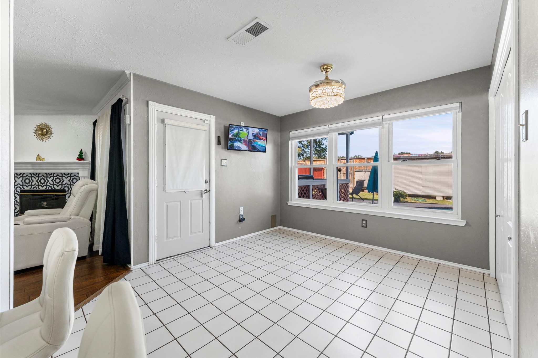 16506 Crossfield Drive Houston, TX 77095 - Photo 8 of 20 a bedroom with a bed and a large window