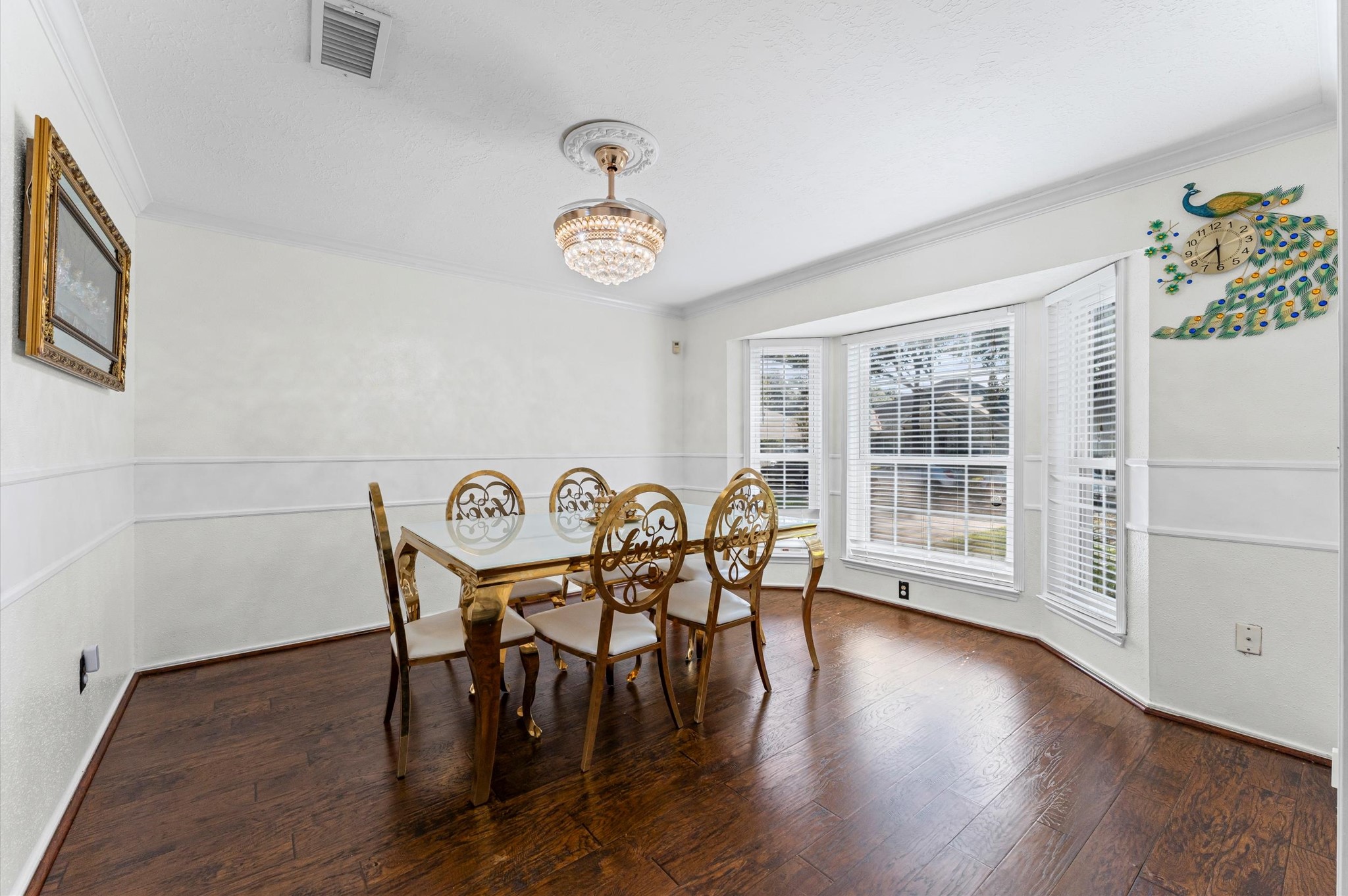 16506 Crossfield Drive Houston, TX 77095 - Photo 9 of 20 a view of a dining room with furniture window and wooden floor