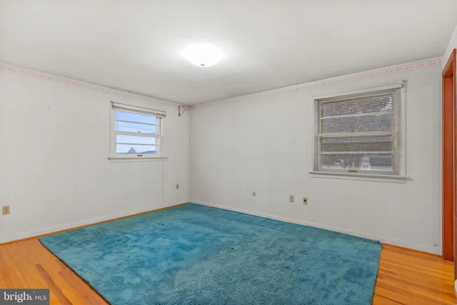 a bathroom with a sink a mirror and a shower