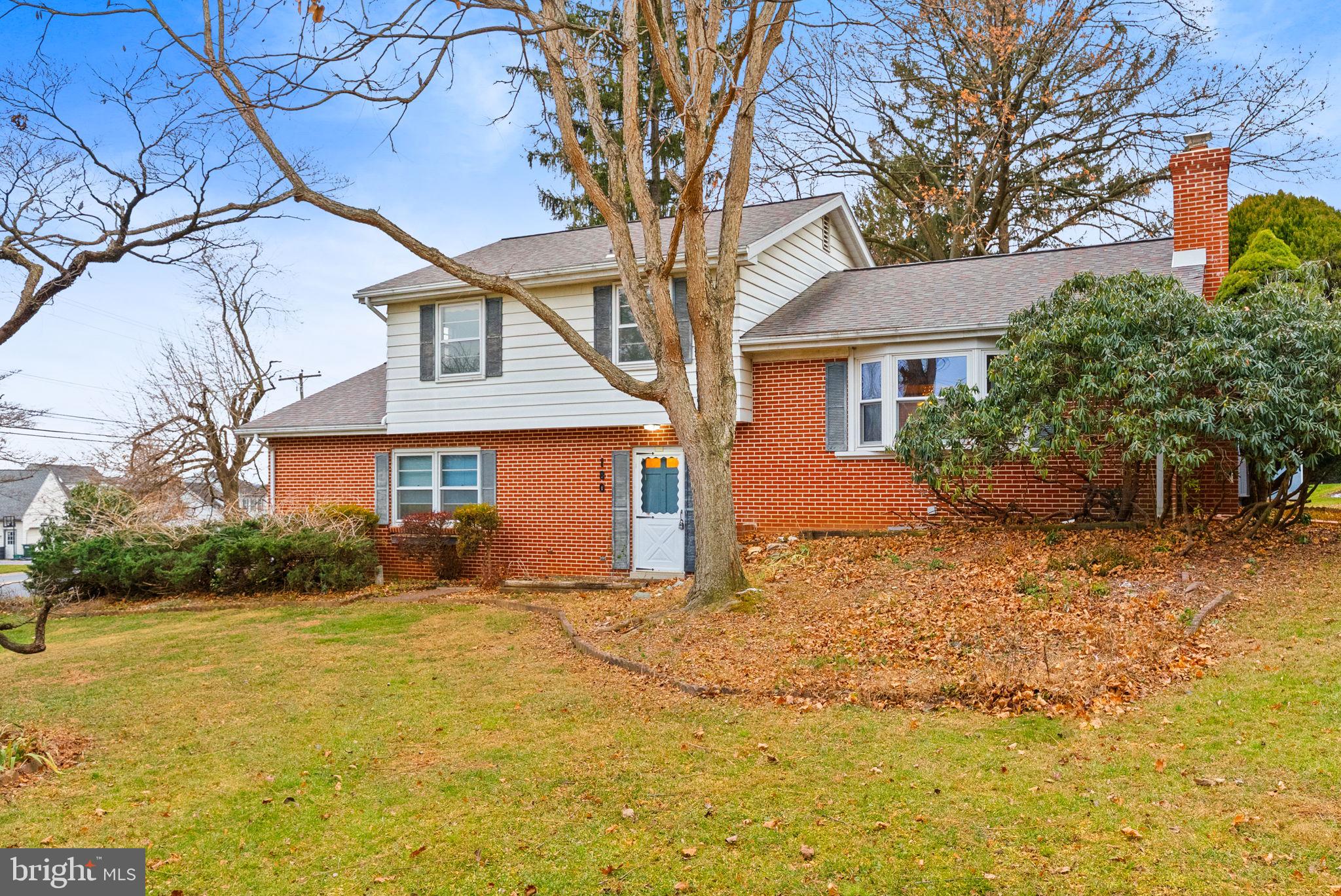 180 Delp Road Lancaster, PA 17601 - Photo 2 of 40 front view of a house with a yard