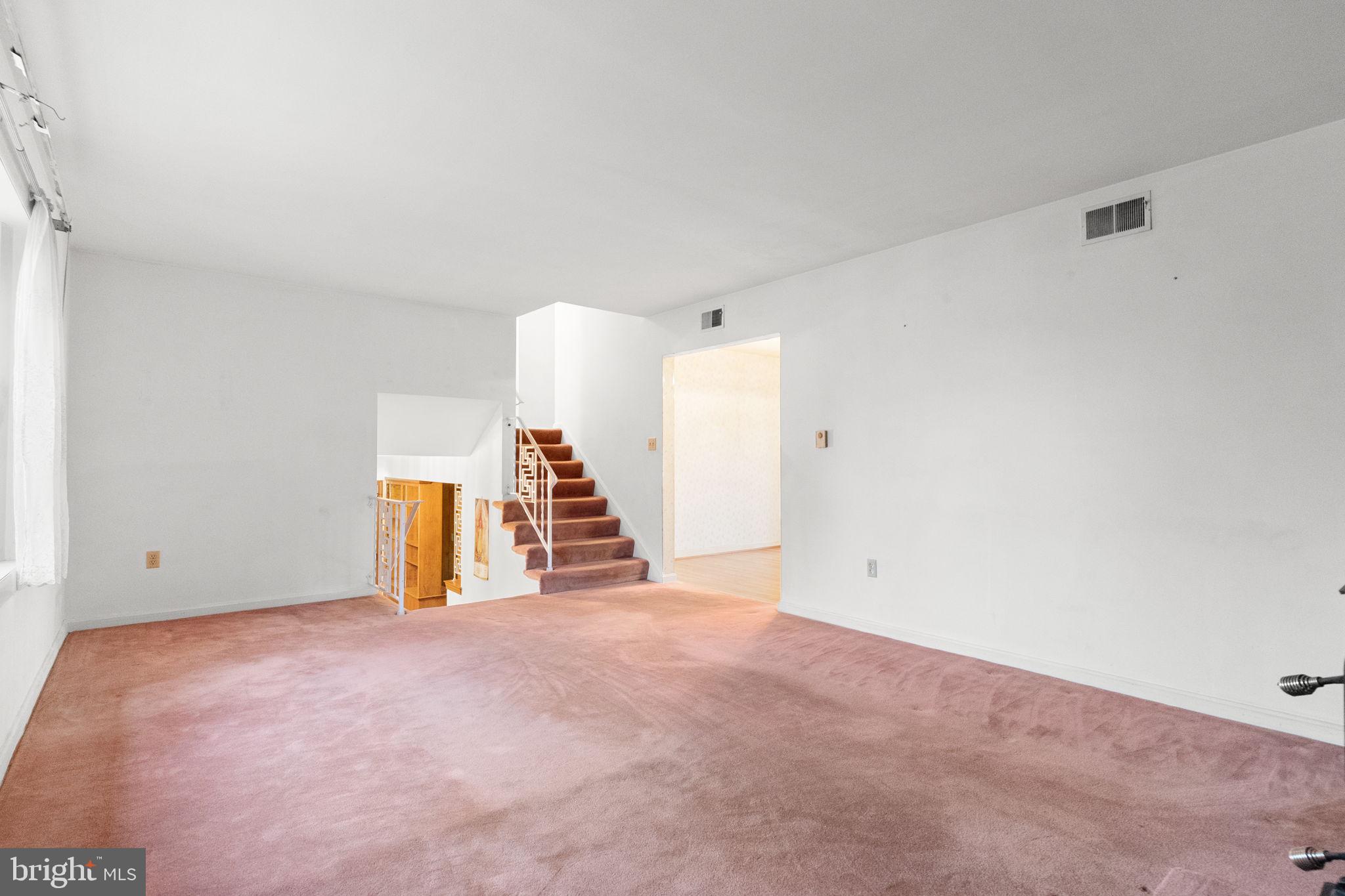 180 Delp Road Lancaster, PA 17601 - Photo 6 of 40 a view of an empty room with stairs