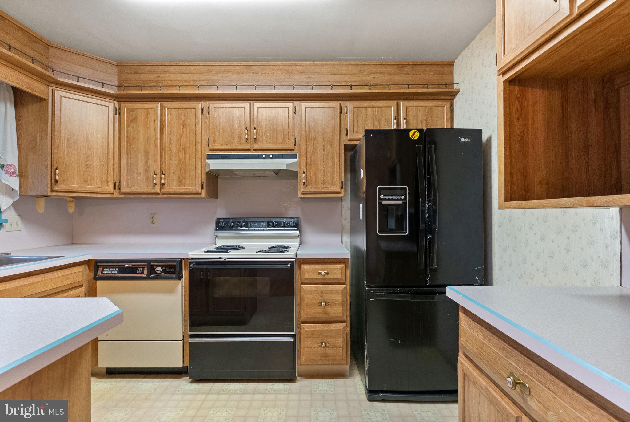 180 Delp Road Lancaster, PA 17601 - Photo 10 of 40 a kitchen with stainless steel appliances granite countertop a refrigerator and a stove