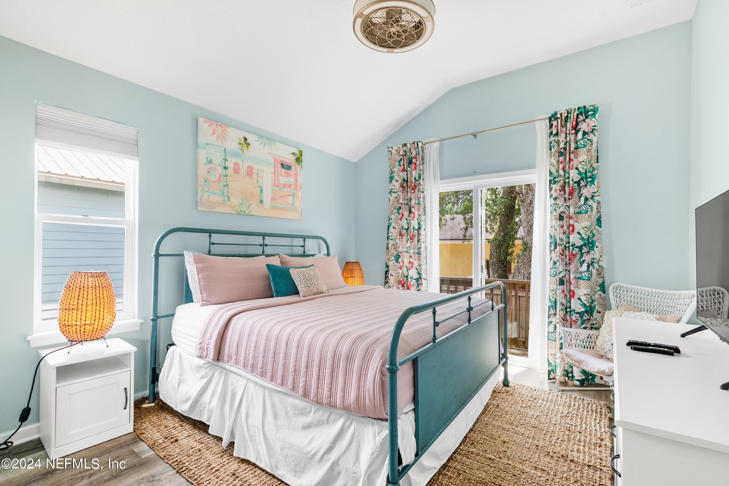 603 Boating Club Road St. Augustine, FL 32084 - Photo 18 of 32 a bedroom with bed and a window