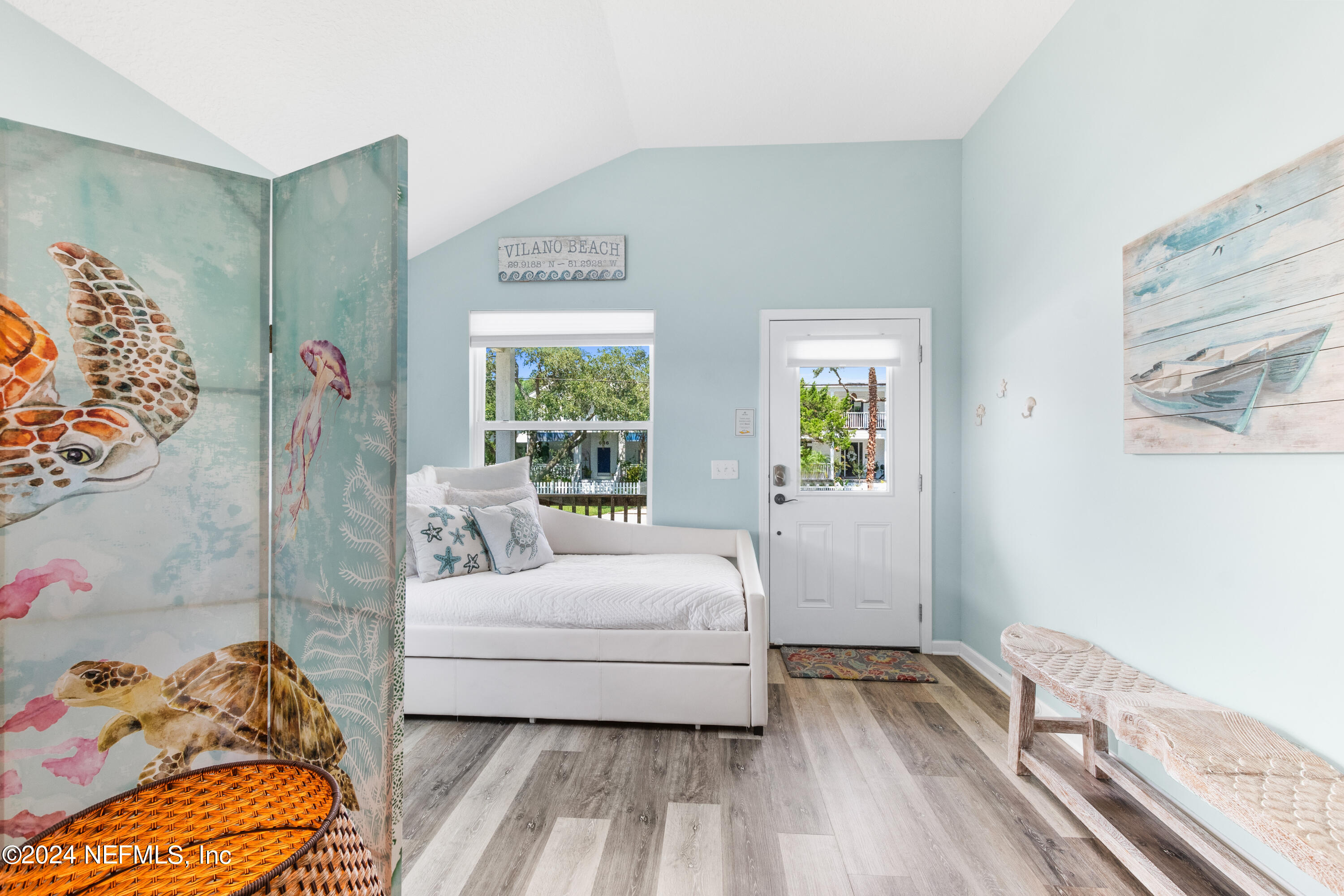 603 Boating Club Road St. Augustine, FL 32084 - Photo 5 of 32 a bedroom with a bed and a couch