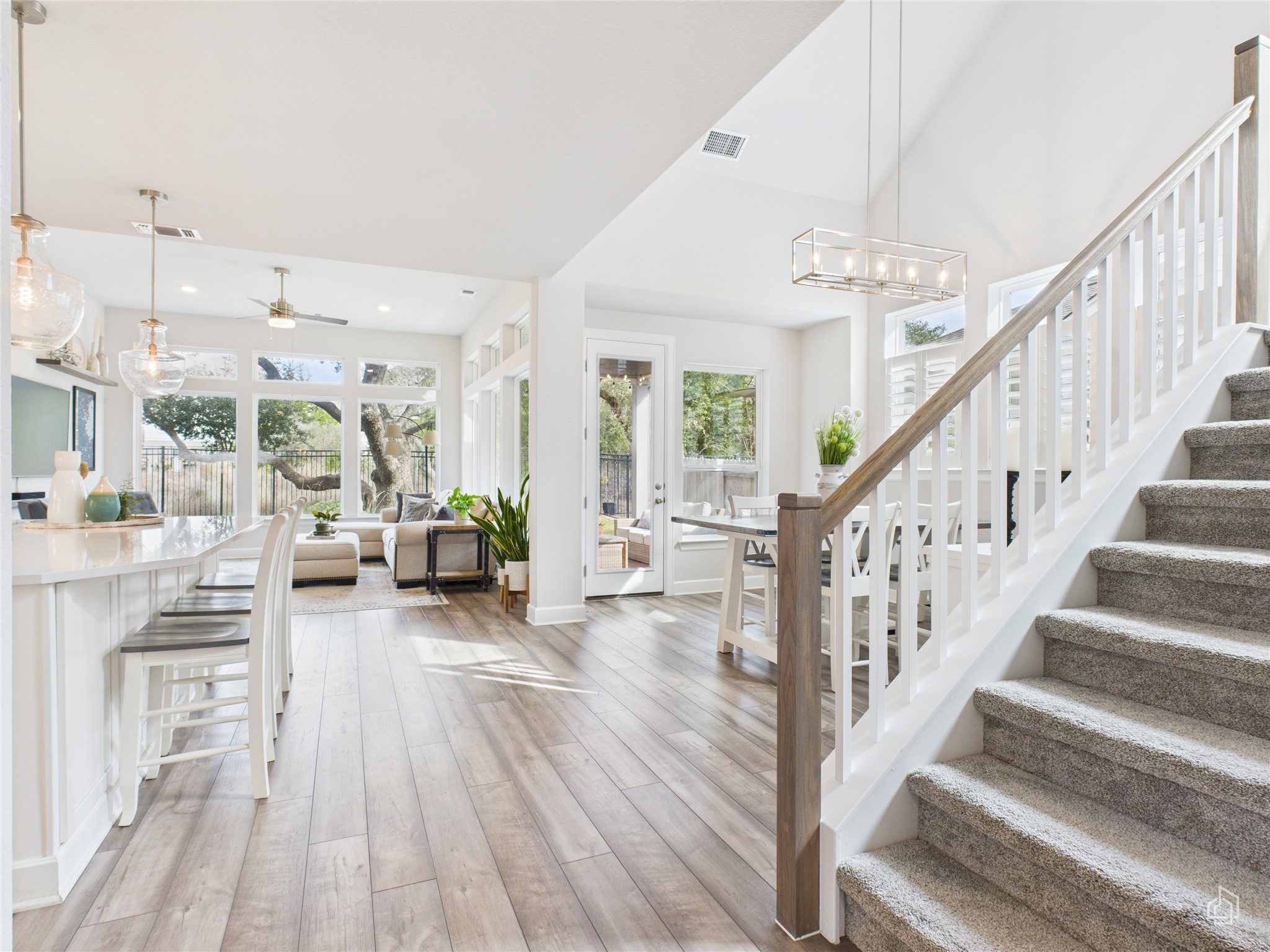 378 Moonlit Stream Pass Dripping Springs, TX 78620 - Photo 12 of 38 a view of an entryway and livingroom with wooden floor
