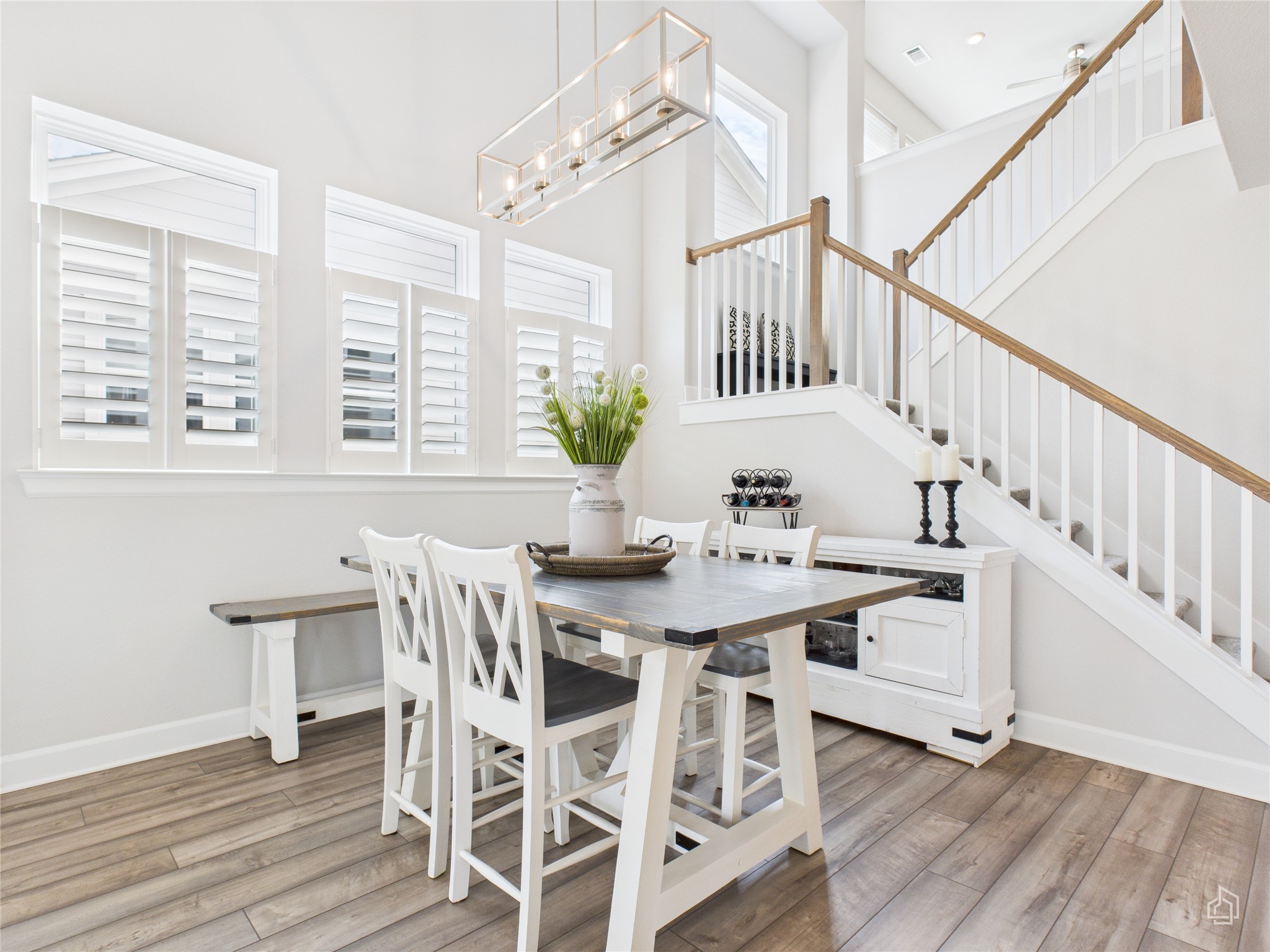 378 Moonlit Stream Pass Dripping Springs, TX 78620 - Photo 14 of 38 a view of a dining room with furniture window and wooden floor