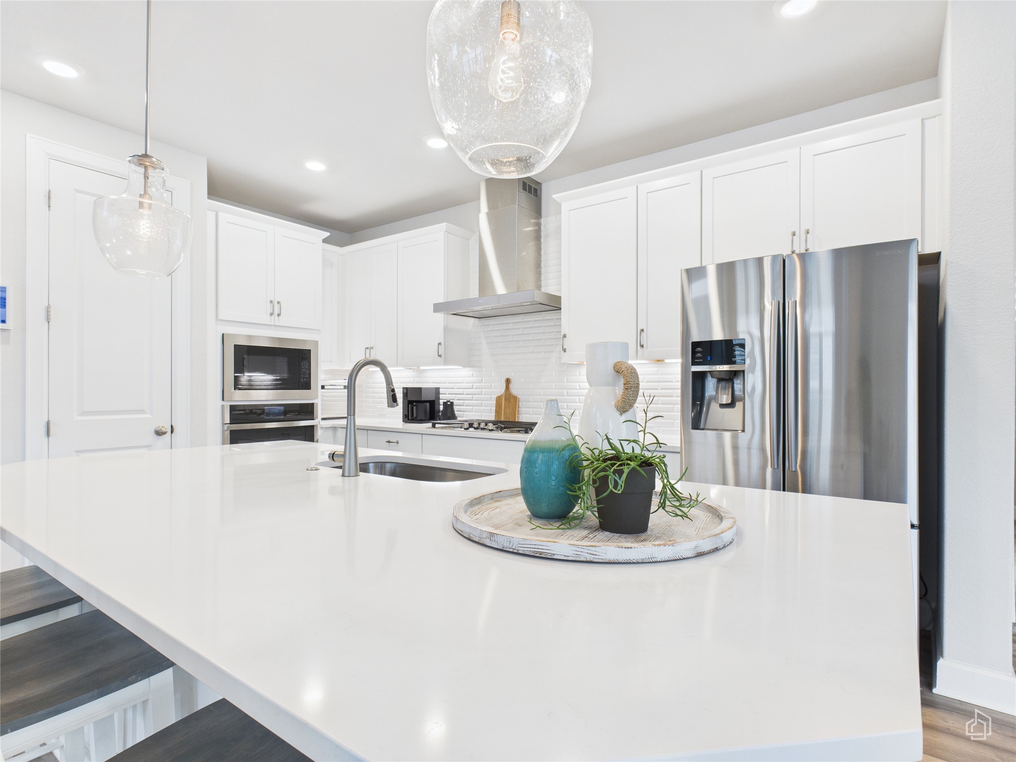 378 Moonlit Stream Pass Dripping Springs, TX 78620 - Photo 17 of 38 a kitchen with stainless steel appliances granite countertop a refrigerator and a sink