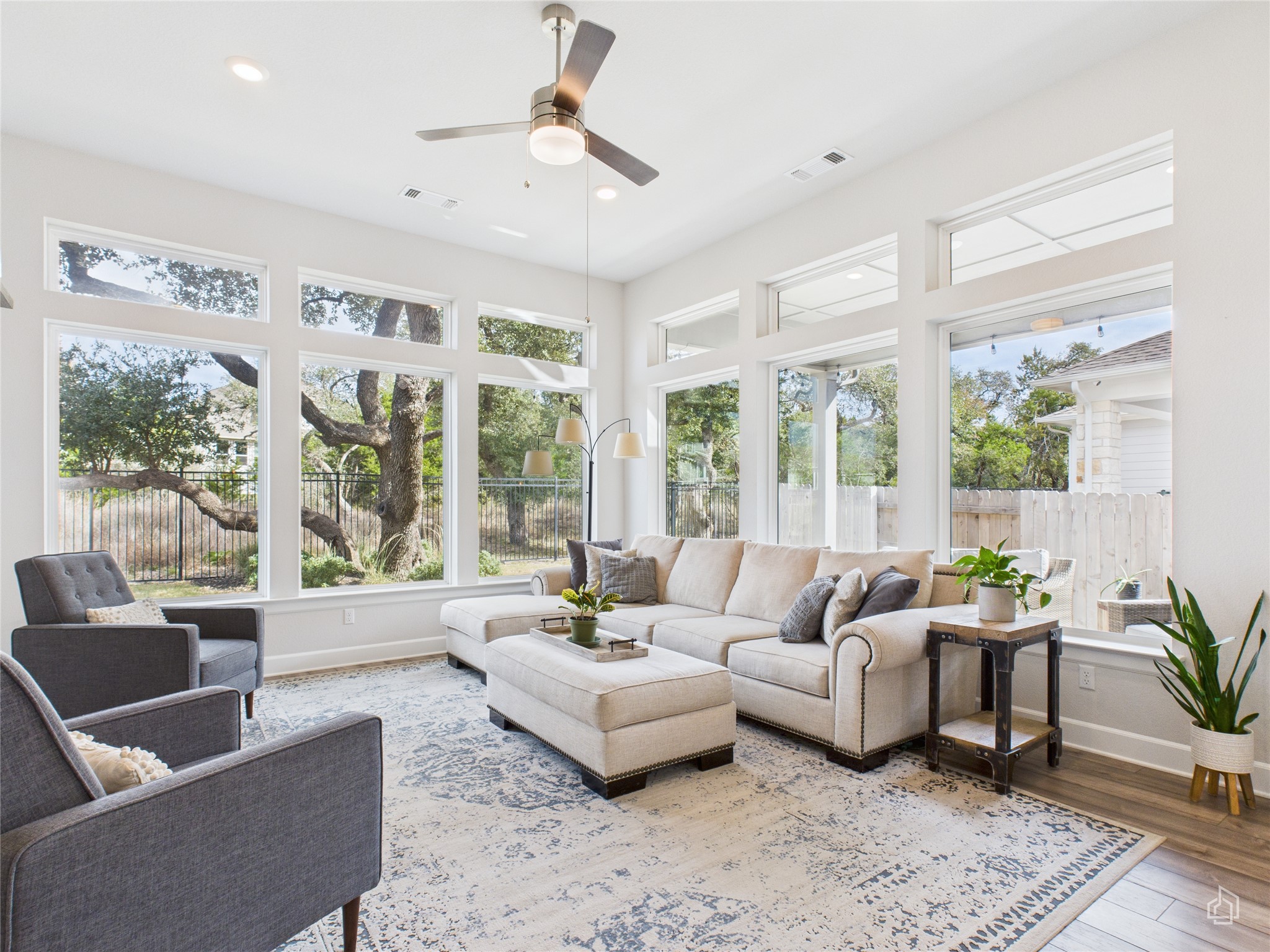 378 Moonlit Stream Pass Dripping Springs, TX 78620 - Photo 22 of 38 a living room with furniture and a large window