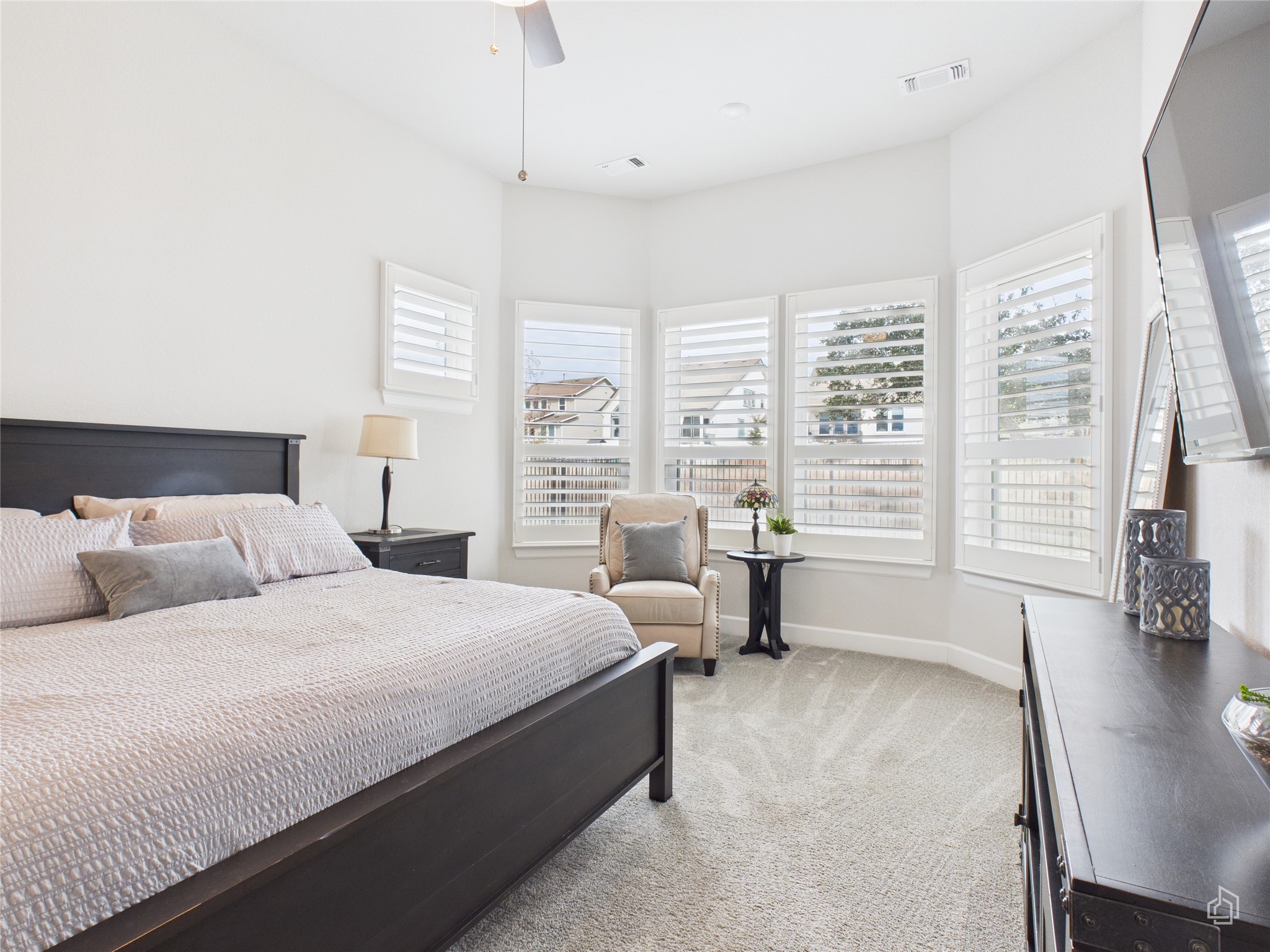 378 Moonlit Stream Pass Dripping Springs, TX 78620 - Photo 23 of 38 a bedroom with a bed and a large window