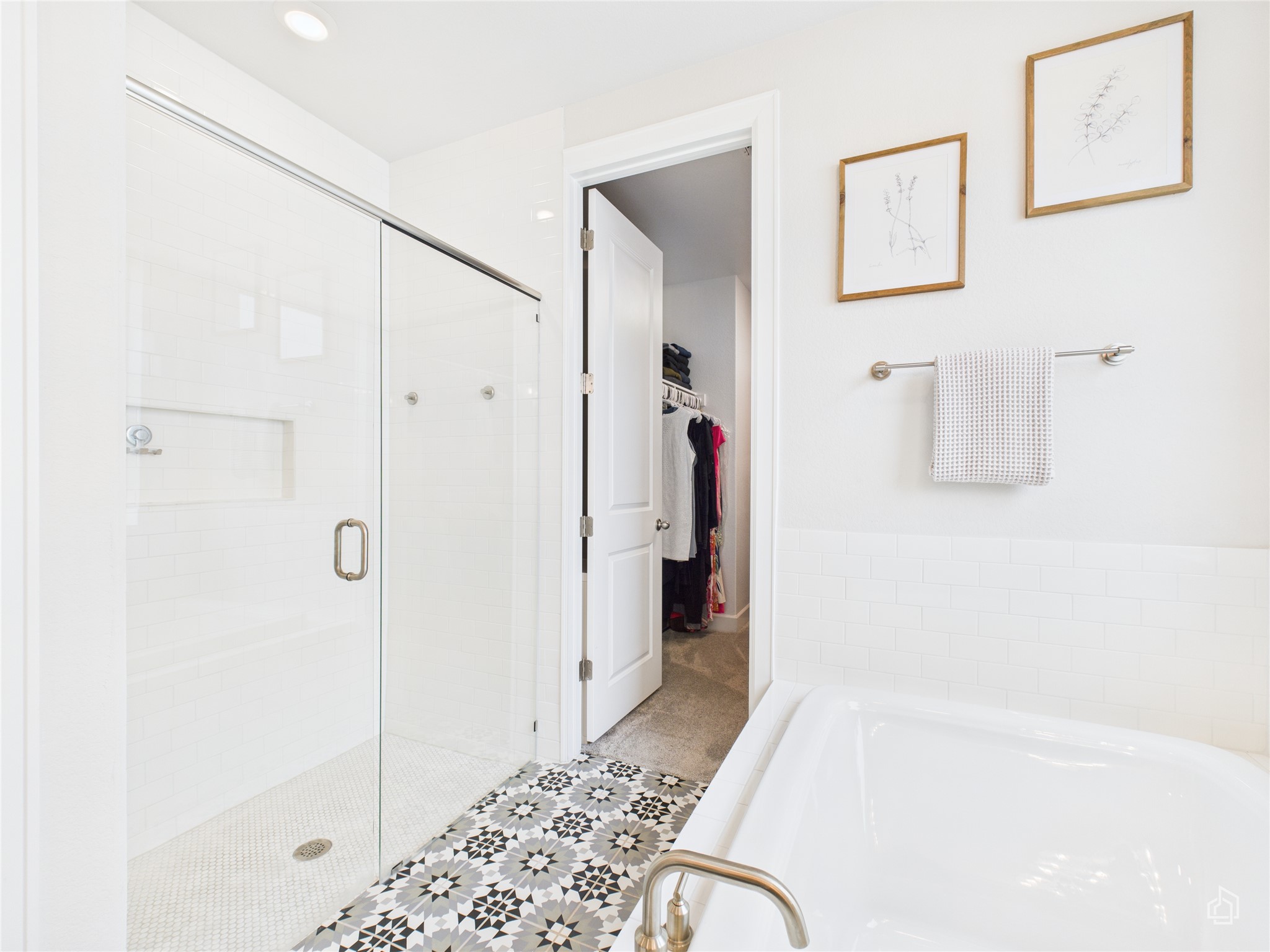 378 Moonlit Stream Pass Dripping Springs, TX 78620 - Photo 26 of 38 a bathroom with a bathtub and a shower