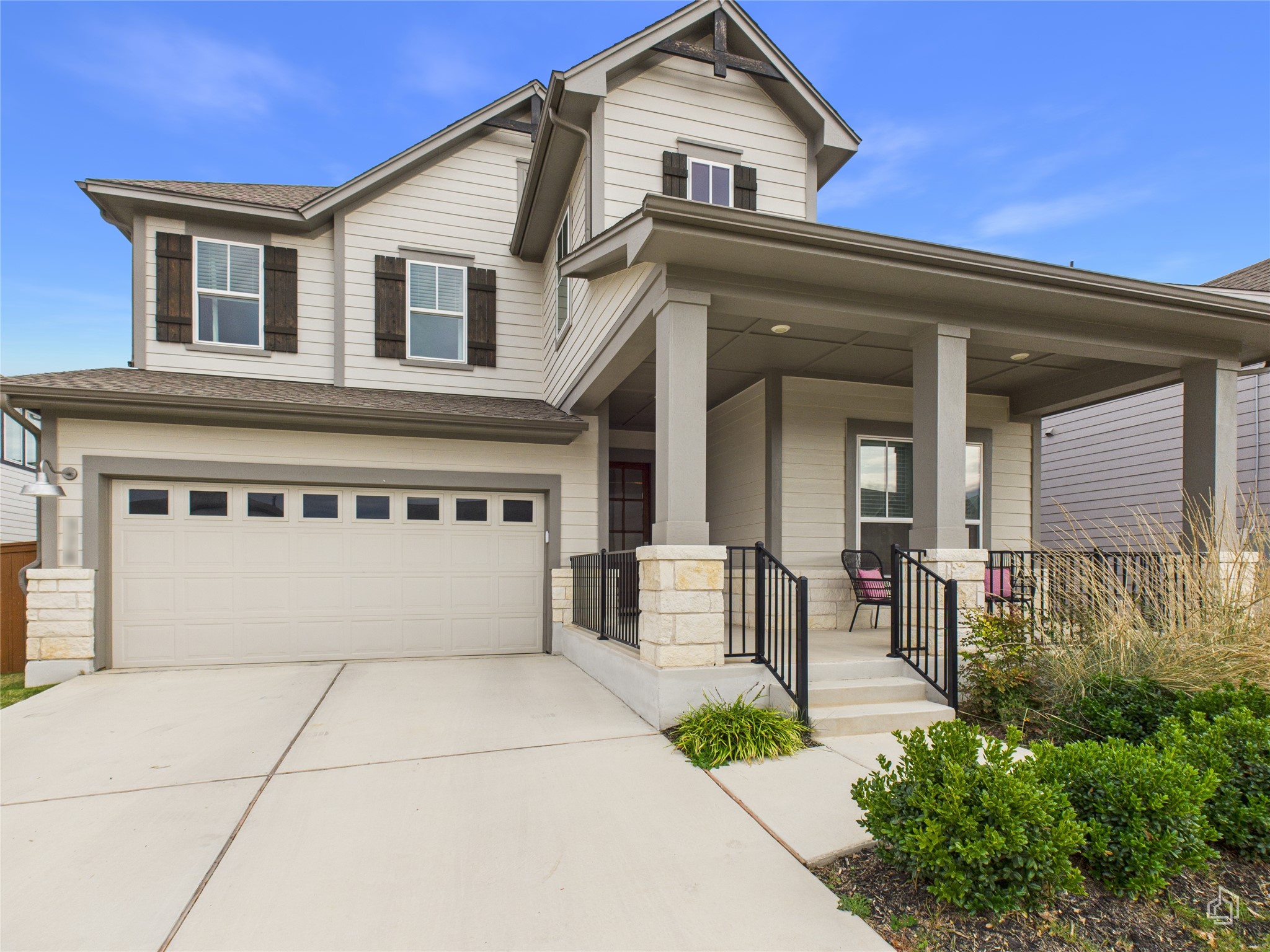 378 Moonlit Stream Pass Dripping Springs, TX 78620 - Photo 3 of 38 front view of a house with a bench