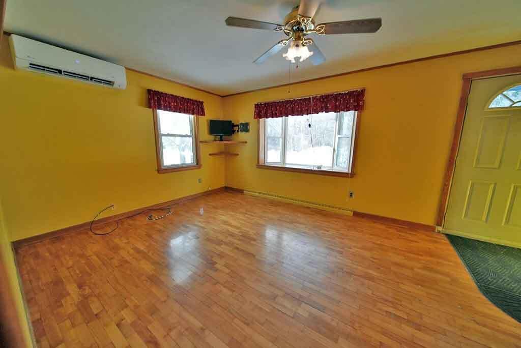 20 Cleaves Street Crystal, ME 04747 - Photo 38 of 63 living-room-heat-pump