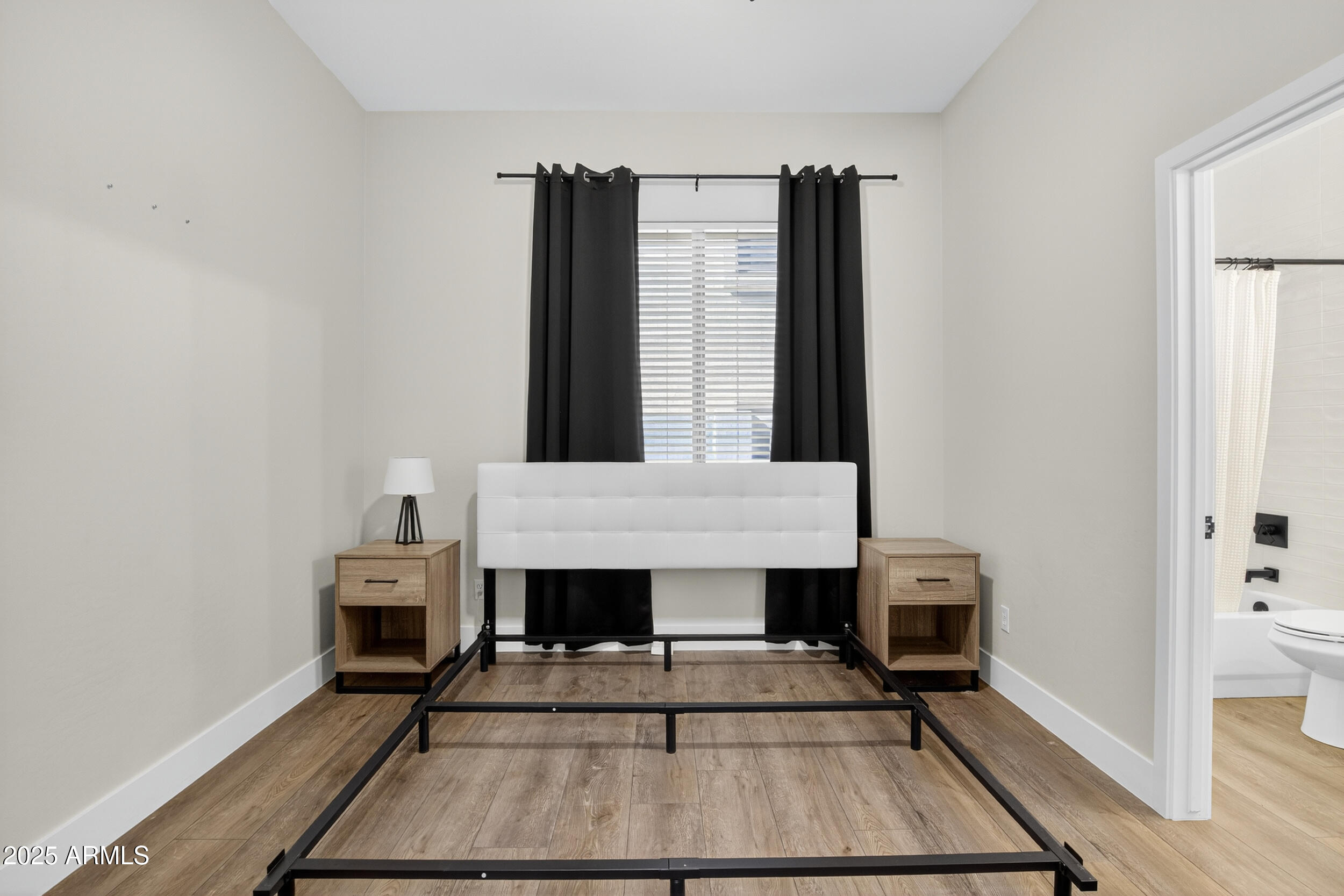 10587 East Sheena Drive Scottsdale, AZ 85255 - Photo 19 of 56 a living room with furniture a fireplace and a table