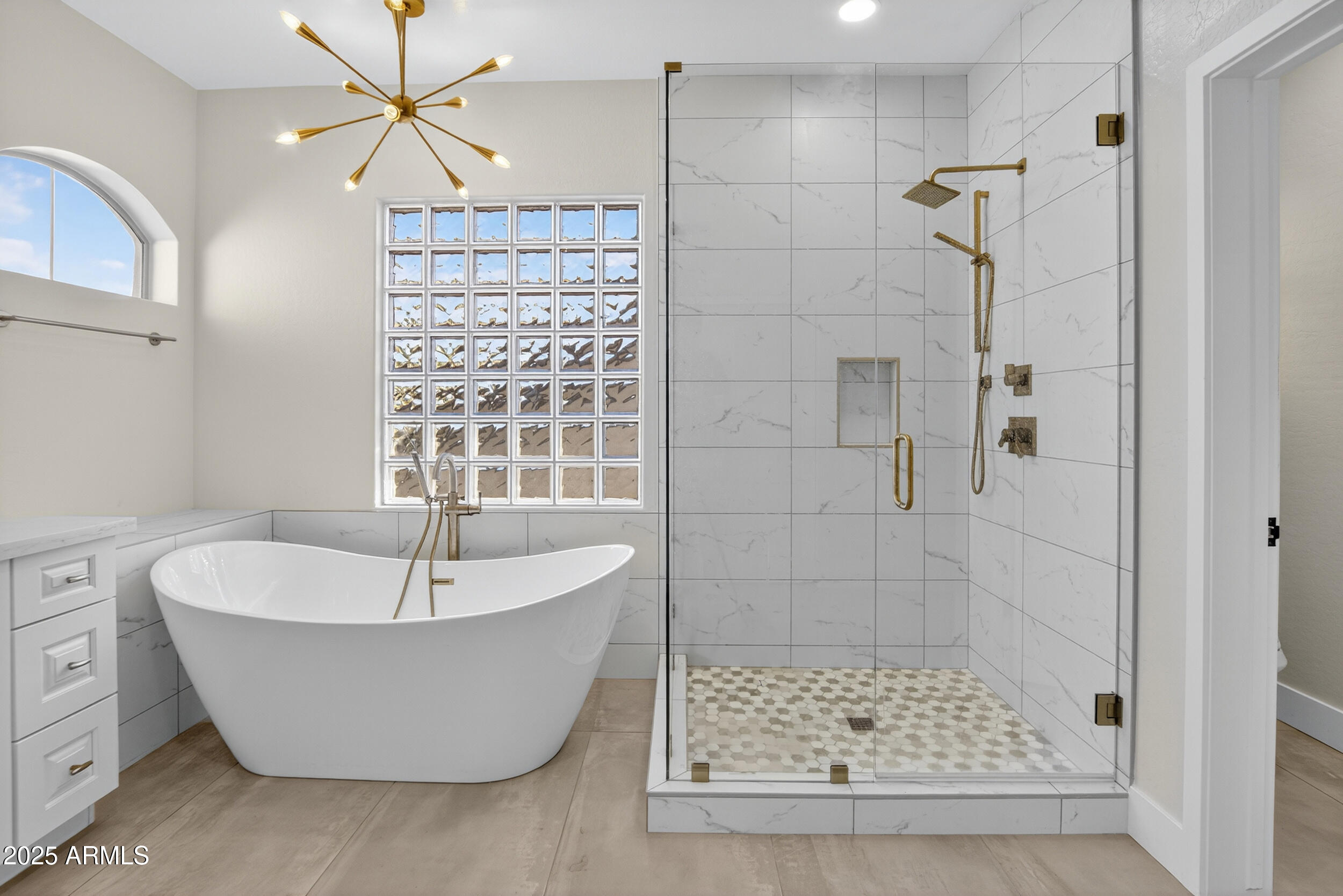 10587 East Sheena Drive Scottsdale, AZ 85255 - Photo 32 of 56 a white bath tub sitting next to a shower