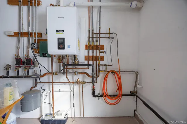 a view of living room with furniture and wooden floor