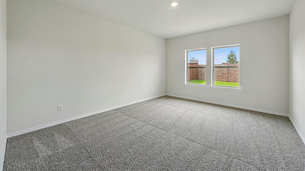 4607 Enclave Drive Sanger, TX 76266 - Photo 11 of 34 an empty room with a window