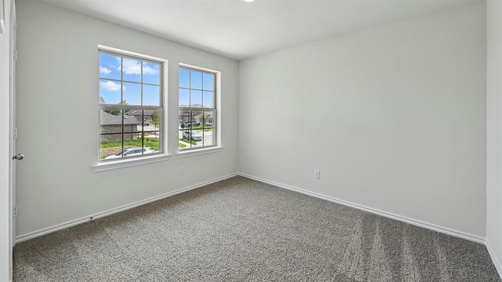4607 Enclave Drive Sanger, TX 76266 - Photo 15 of 34 an empty room with windows