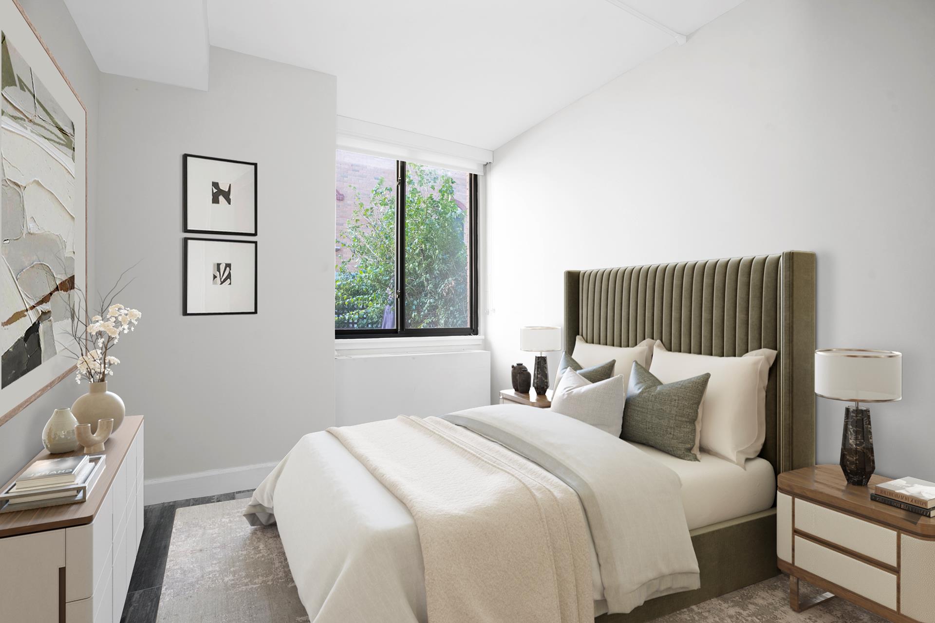 199 Bowery, Unit 2A Manhattan, NY 10002 - Photo 8 of 10 a bedroom with a bed and a window