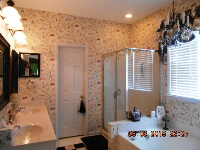 5404 Calverton Drive Raleigh, NC 27613 - Photo 14 of 25 Master Bath/Spa