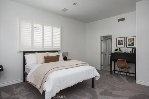 a utility room with sink dryer and washer