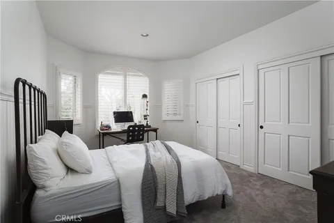 a view of two chairs in the balcony