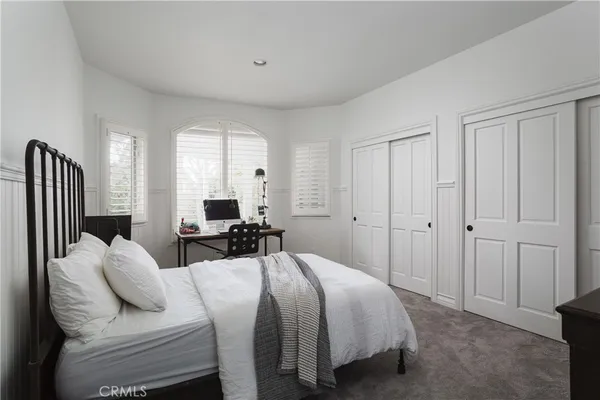 a view of two chairs in the balcony