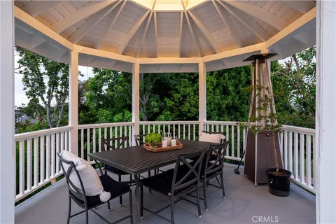 a view of a large brick building next to a yard