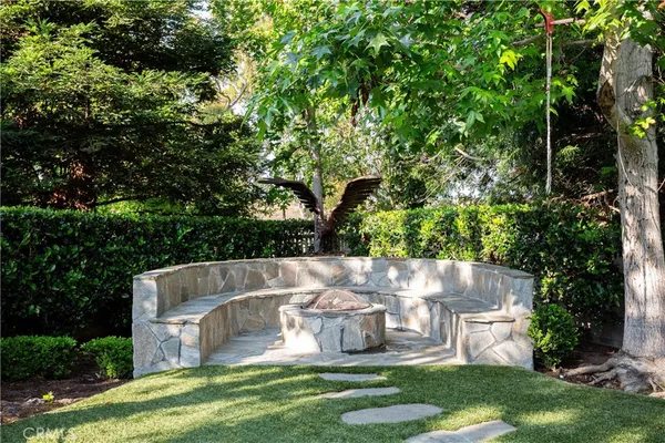 a garden view with a sitting space