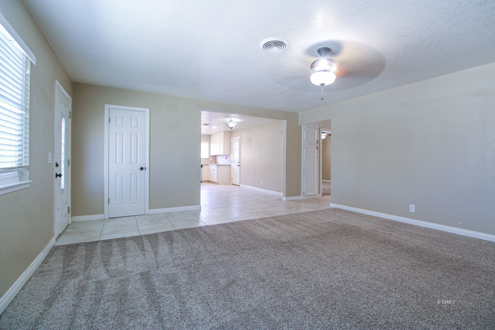 1532 South McCall Street Ridgecrest, CA 93555 - Photo 4 of 27 a view of an empty room with a window